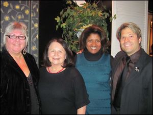 Fair Housing reception at Gerogio's: Kathy Broka, retired President and CEO, Toledo Fair Housing; Shanna Smith, President and CEO of National Fair Housing Alliance in DC; Lisa Rice, VP of National Fair Housing Alliance in DC; and Michael Marsh, new President and CEO, Toledo Fair Housing.