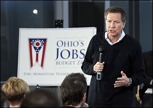Gov. John Kasich speaks in Maumee. Wednesday’s visit was Mr. Kasich’s second stop on a road tour to tout his budget proposal.