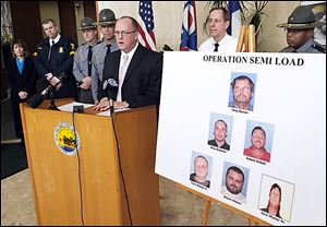 FBI Special Agent Joseph Callahan talks about arrests in a chop shop operation during a news conference at One Government Center in Toledo.