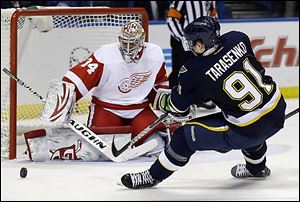 Red Wings goalie Petr Mrazek, a former Walleye player, stops St. Louis’ Vladimir Tarasenko during the second period.
