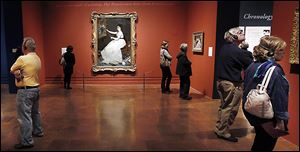 Art enthusiasts enjoy the last day of the popular Manet exhibit at the Toledo Museum of Art on Jan. 1.