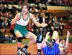 Delta freshman Jake Spiess reacts to his win at 106 pounds in the Division III state team final against Tuslaw's Shane Johnston. The Panthers won the championship.