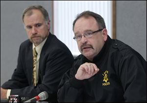 Lake Township Police Chief Mark Hummer, right, immediately after the rampage at the Eastpointe on the Mall apartment complex, said he asked the Ohio Bureau of Criminal Identification and Investigation to review the shooting.