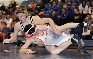 Perrysburg's Ryan Roth, top, controls Southview's Brendan Mulvaney during their 145-pound final match. Roth got the pin for his 122nd victory, which is a Perrysburg school record. Roth’s title was one of nine individual titles for the Yellow Jackets.