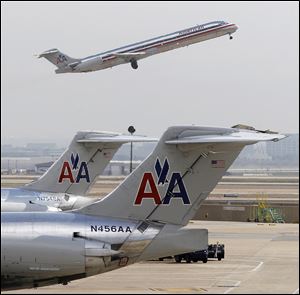 The boards of American Airlines parent AMR Corp. and US Airways have pushed back meetings to consider final plans for their merger, Associated Press sources say. A source close to the matter said Sunday that the AMR board wants to meet in person, and that the US Airways board would only meet after the AMR board approves a deal. The source requested anonymity because the talks are private.