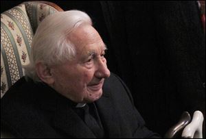 Georg Ratzinger, brother of the outgoing Pope Benedict XVI, answers journalists' questions during a media opportunity in his home in Regensburg, southern Germany.