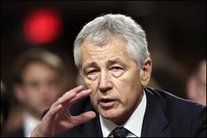 Nebraska Republican Sen. Chuck Hagel, President Obama's choice for defense secretary, testifies before the Senate Armed Services Committee during his confirmation hearing, on Capitol Hill in Washington.