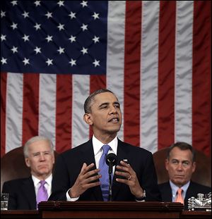 President Obama is flanked by Vice President Joe Biden and House Speaker John Boehner during his State of the Union address. In Tuesday’s speech, he urged Americans to be the ‘authors of the next great chapter in our American story.'