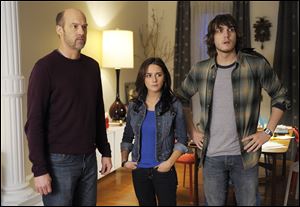 Anthony Edwards, left, Addison Timlin and Scott Michael Foster in a scene from 
