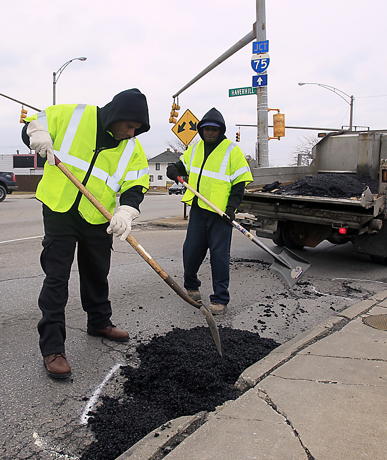 Workers take to Toledo streets to patch potholes The Blade