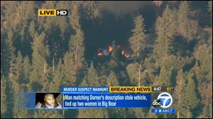 In this image taken from video provided by KABC-TV, the cabin in Big Bear, Calif. where ex-Los Angeles police officer Christopher Dorner was believed to be barricaded inside during a standoff with police officers is in flames Tuesday. 