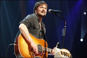 Country singer Eric Church performs leads with seven nominations for American Country Music awards.