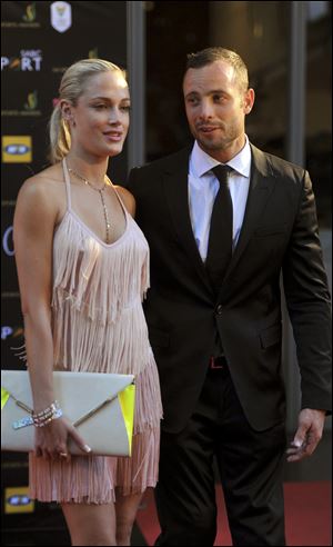South African Olympic athlete Oscar Pistorius and Reeva Steenkamp.