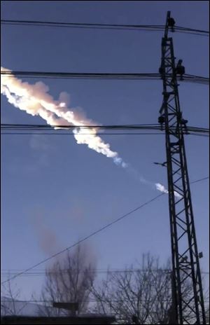 A meteorite contrail is seen in Chelyabinsk region on Friday.