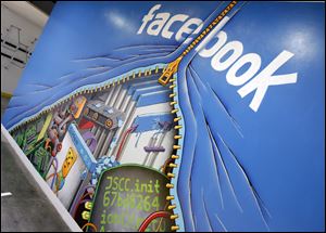A mural at Facebook headquarters in Menlo Park, Calif. Intruders recently infiltrated the systems running the world's largest online social network but did not steal any sensitive information about its more than 1 billion users, according to a blog posting Friday by the company's security team.