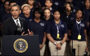 President Barack Obama speaks about the nation's struggle with gun violence at an appearance today at Hyde Park Academy in Chicago.