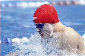 St. Francis’ Jack Barone does the breaststroke leg of the 200-yard medley relay, which the Knights won.