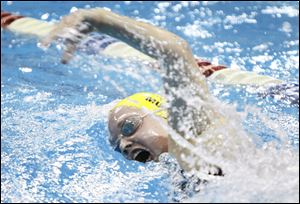 St. Ursula’s Mikayla Murphy races to a win in the 200-yard individual medley.