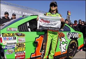 Danica Patrick averaged 196.435 mph in qualifying to become the first woman to capture the pole position for the Daytona 500.