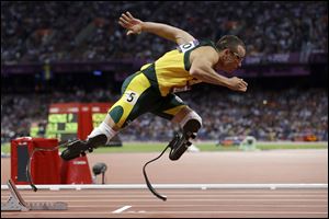Paralympic superstar Oscar Pistorius was charged Thursday, Feb. 14, 2013, with the murder of his girlfriend who was shot inside his home in South Africa, a stunning development in the life of a national hero known as the Blade Runner for his high-tech artificial legs.