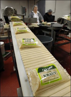 Bags of Frank's Kraut come off the line at the Fremont Co.
