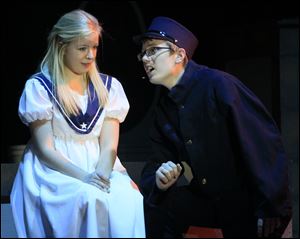 From a rehearsal today at Northview High School of 'The Sound of Music' are performances of Liesl, played by Kailee McAfee, left, and Rolf, the telegram deliverer, played by Joe Jennewine.   