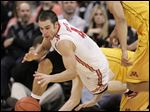  Ohio State's Aaron Craft dives after a steal against Minnesota during the second half.