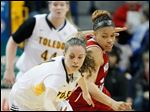  Toledo's Naama Shafir steals the ball from Northern Illinois player Alicia Johnson.