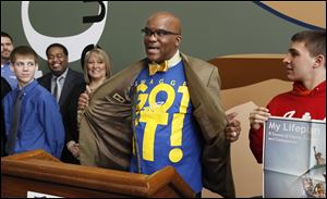 John Henry Livingston displays his 'Swagger Got It' shirt as he talks about the Leadership with Swagger initiative during a news conference at the University of Toledo.