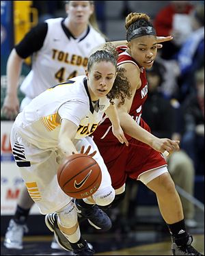 Toledo's Naama Shafir steals the ball from Northern Illinois' Alicia Johnson during the first half at Savage Arena. Shafir scored 25.