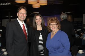 From left, Tom Waggoner, Alexis Waggoner, and Karen Mathison at United Way of Greater Toledo's annual meeting and recognition event.