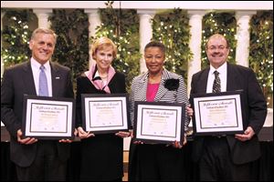 Winners of the 2013 Toledo-area Jefferson Awards are, from left, Dean Ludwig, Joan Durgin, Laneta Goings, and Tony Siebeneck. The ceremony Thursday was attended by more than 500 people. 