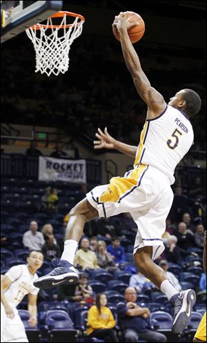 Toledo's Rian Pearson soars for two points during the game against McNeese State. Pearson had a game-high 21 points.