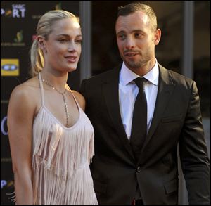 A November photo of Oscar Pistorius and his girlfriend Reeva Steenkamp, whom he has admitted he killed in a recent incident in his apartment. 