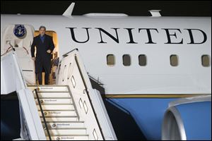 US Secretary of State John Kerry leaves the plane after his arrival in Germany today. 