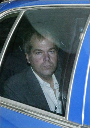 John Hinckley Jr. arrives at U.S. District Court in Washington. Hinckley, the man who shot President Ronald Reagan is back in court for hearings on whether he should get to spend more time away from the psychiatric hospital where he has been living.