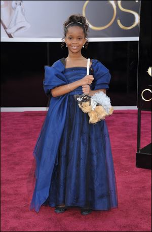 Actress Quvenzhane Wallis arrives at the 85th Academy Awards at the Dolby Theatre Sunday in Los Angeles.