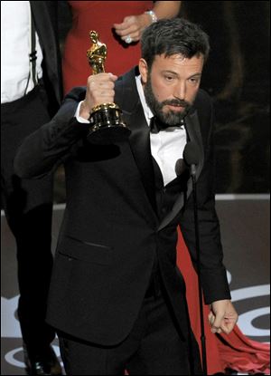 Ben Affleck accepts the award for best picture for 