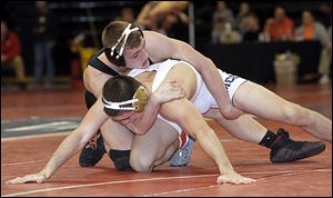 Delta junior Tyler Fahrer controls Adam Guerra of Sandusky St. Mary in the 145-pound final at the Division III district final. Fahrer is 43-6 and was a state runner-up last season.