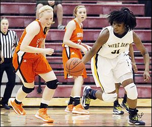 Notre Dame's Tierra Floyd, who finished with 10 points, makes a steal Wednesday night in a Division I district semifinal against Southview.