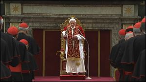 Pope Benedict XVI deliveres his final greetings to the assembly of cardinals at the Vatican today before he officially retires.