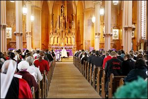 Bishop Leonard Blair leads a Eucharistic Adoration and  Mass for Pope Benedict XVI in St. Francis DeSales  Church, Cherry Street, the city’s first Catholic cathedral.