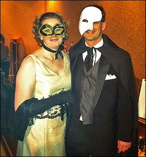Dave Bodner, Maumee Rotary Service Foundation President and wife Beth, left, attend the Phantom of the Auction.