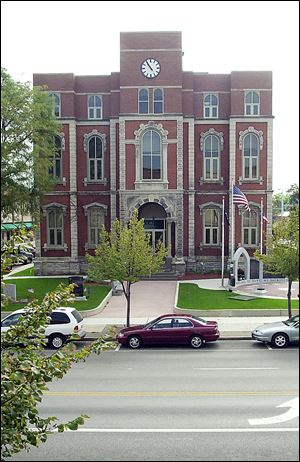 Defiance County Courthouse, shown in 2000, lost much of its historical value, some say, when the top floor was remodeled years ago in a modern style. 