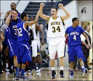 Nate Holley celebrates as Whitmer slips past Springfield in a Division I boys basketball sectional final. A blocked 3-point shot during the final seconds helped the Panthers escape with the victory.