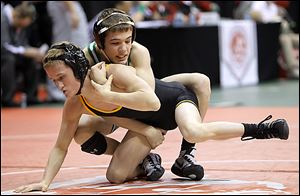 Delta's Jake Spiess, top, beat Black River's Sebastian Vidika 7-1 in the 106-pound semifinals. Spiess (44-4) will wrestle for the title today against Woodmore’s Evan Ulinski (49-3).