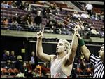  Bedford's Brandon Sunday raises his arms after winning the 215-pound Michigan Division 1 state wrestling title. He defeated Westland John Glenn's Jordan Brandon 5-4 in overtime.