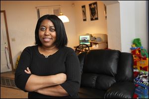 Danielle Peace has lived in her home on Fulton Street in Toledo since 1998. She is hoping to purchase the home, where she lives with her four children, through the Low Income Housing Tax Credit program.