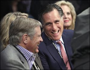 Former Republican presidential candidate Mitt Romney is seen in this December file photo at ringside prior to a welterweight fight between Juan Manuel Marquez and Manny Pacquiao title fight in Las Vegas.