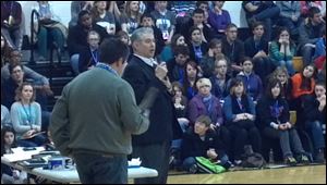 David Saygers of Toledo School for the Arts receives an award at Sunday's closing ceremonies.